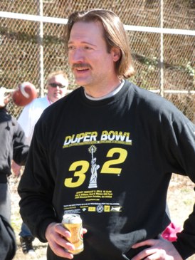 John Has a Halftime Beer as Gordo Checks the Time in Background